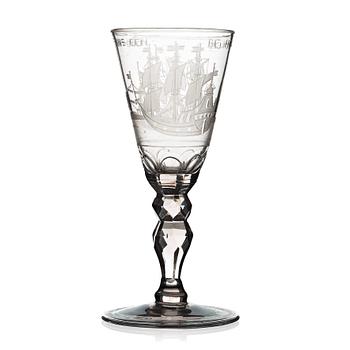 238. A Dutch cut and engraved wine glass, 18th Century.