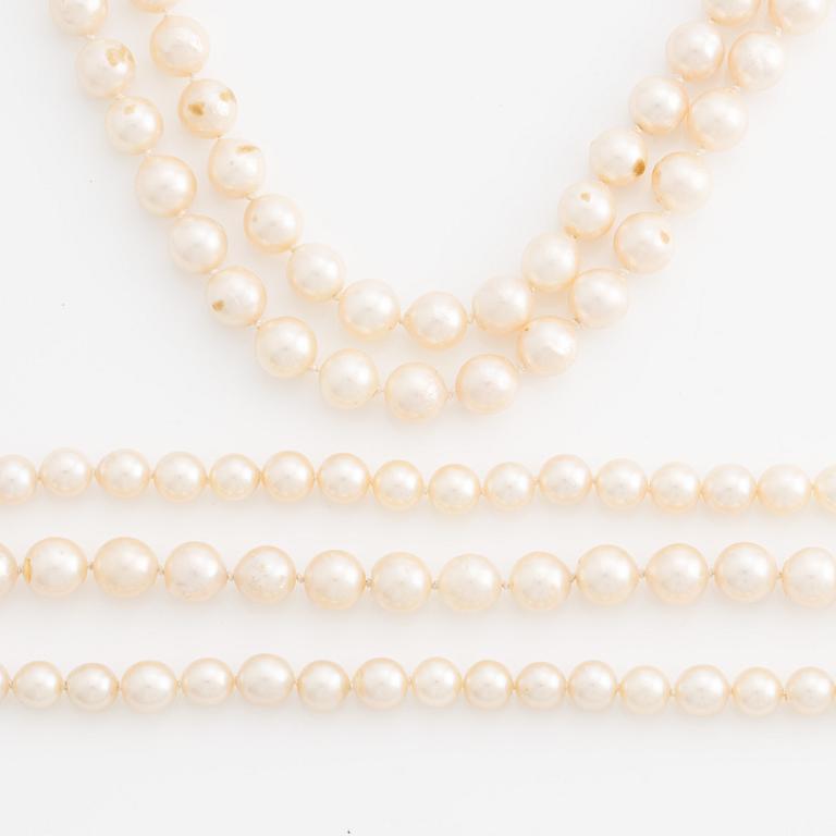 Two necklaces and three bracelets with cultured pearls, for Ole Lynggaard clasp.