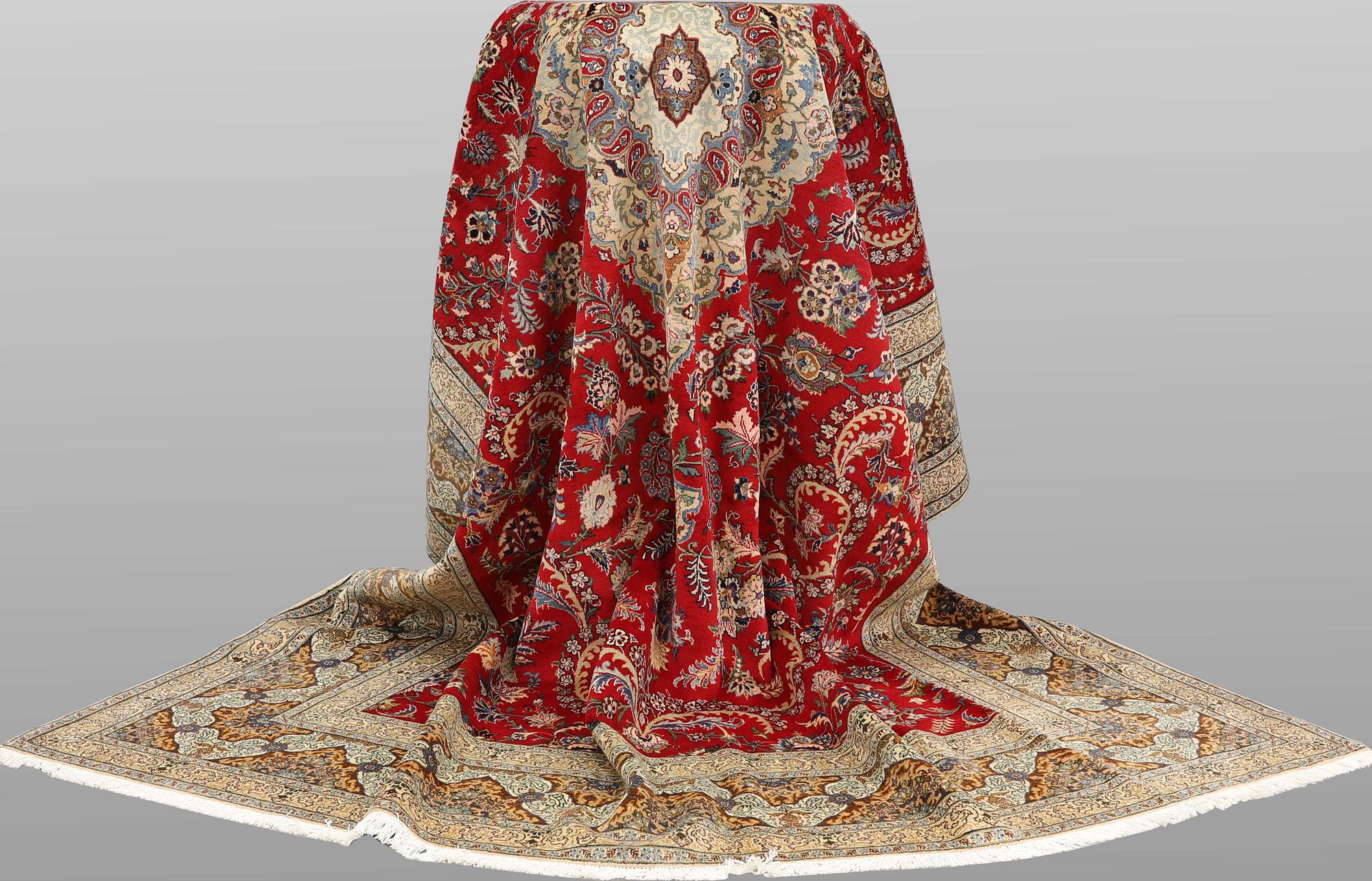 A Keshan carpet, approx. 415 x 300 cm.