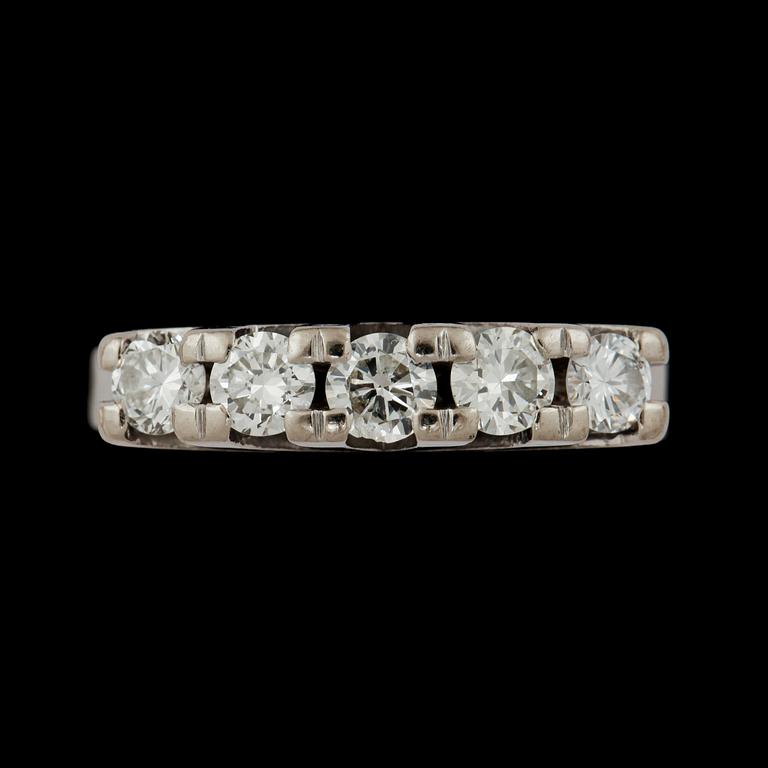 A brilliant cut diamond, totally circa 0.75 ct, ring.
