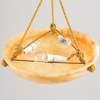 A 1910's/20's alabaster ceiling lamp.