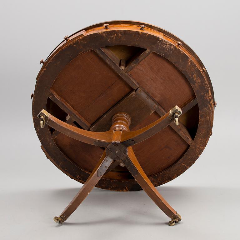 An early 20th century English drum table.