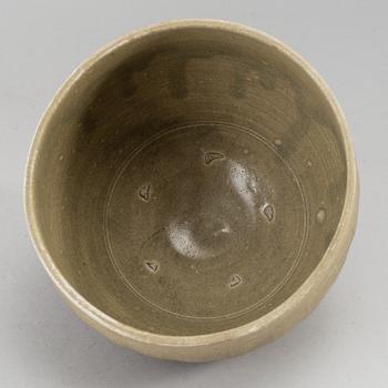 A group of olive green glazed bowls, South East Asia, 20th Century. (6 pieces).