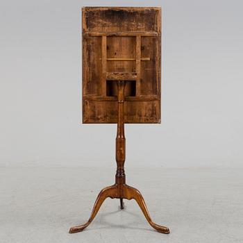 An early 19th century folding table.