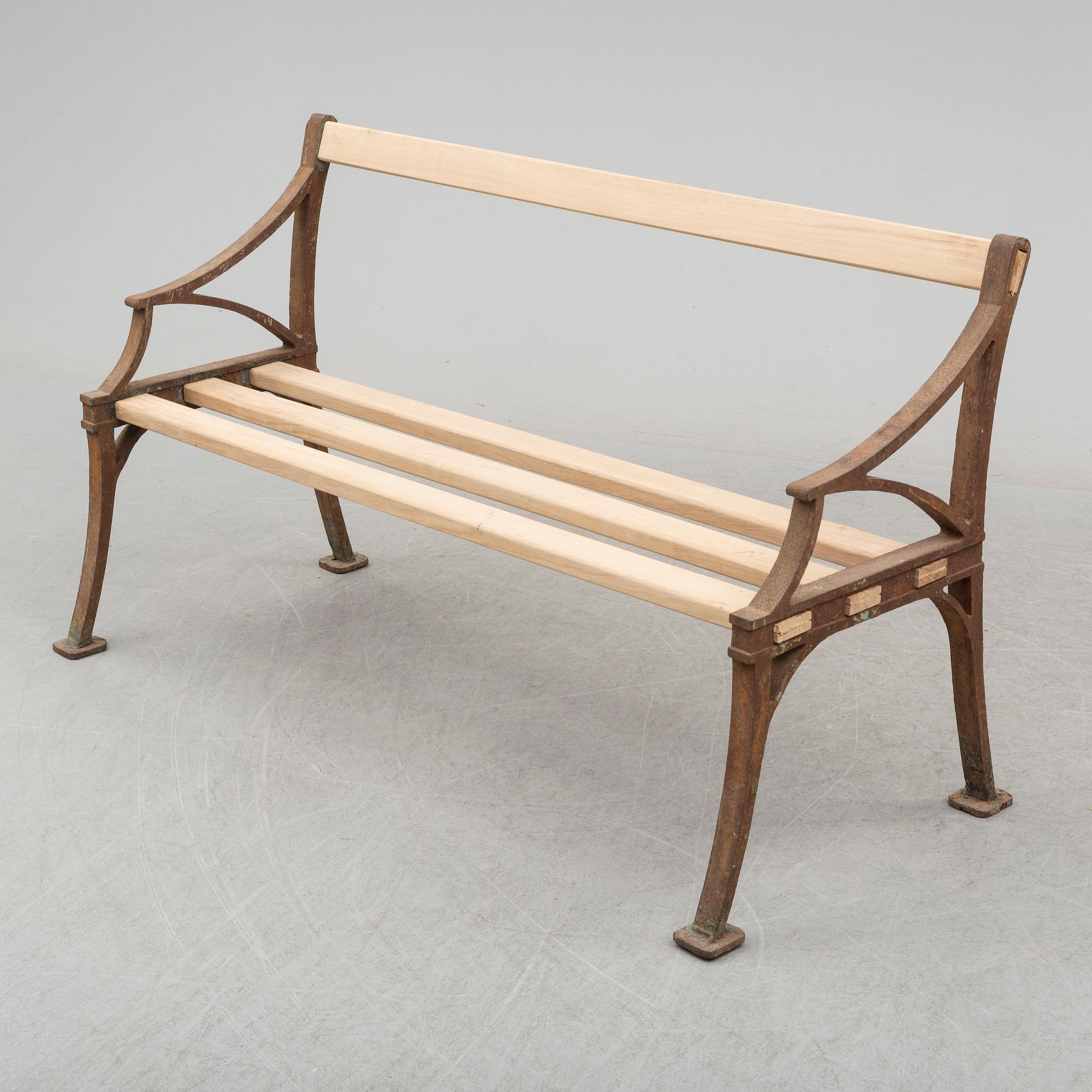 A late 19th century garden sofa by Byarum.