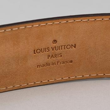 A belt by Louis Vuitton.