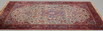 Matto, a semi-antique silk Kashan, ca 212,5-214,5 x 134,5-135,5 cm.