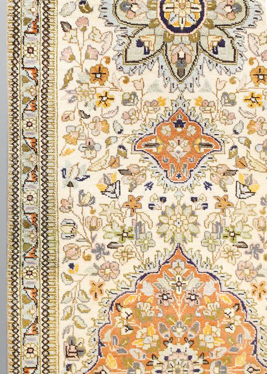 A Tabriz runner, c. 320 x 75 cm.