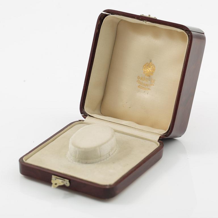 A case, marked Fabergé.