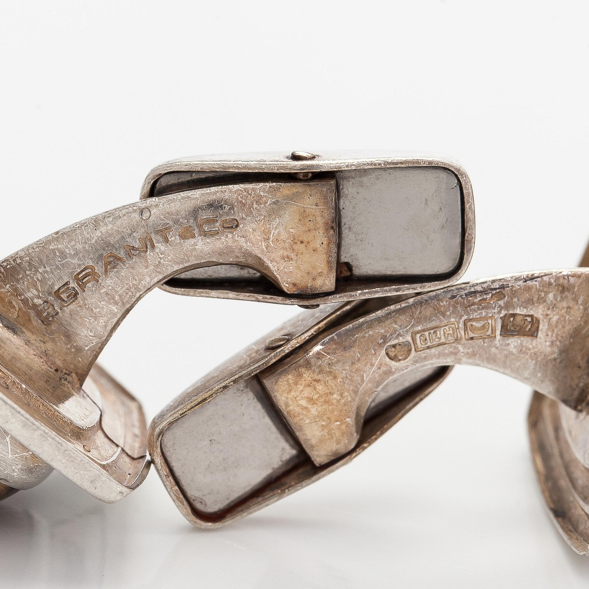 Erik Granit, manschettknappar, 2 par, silver, tigeröga, rökkvarts. Helsingfors 1964.