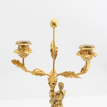 A pair of Empire candelabras from the first half of the 19th century.