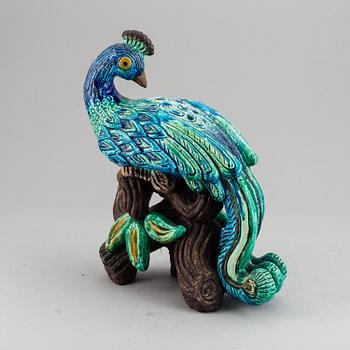 GUNNAR NYLUND, a stoneware figurine of a peacock, Rörstrand.