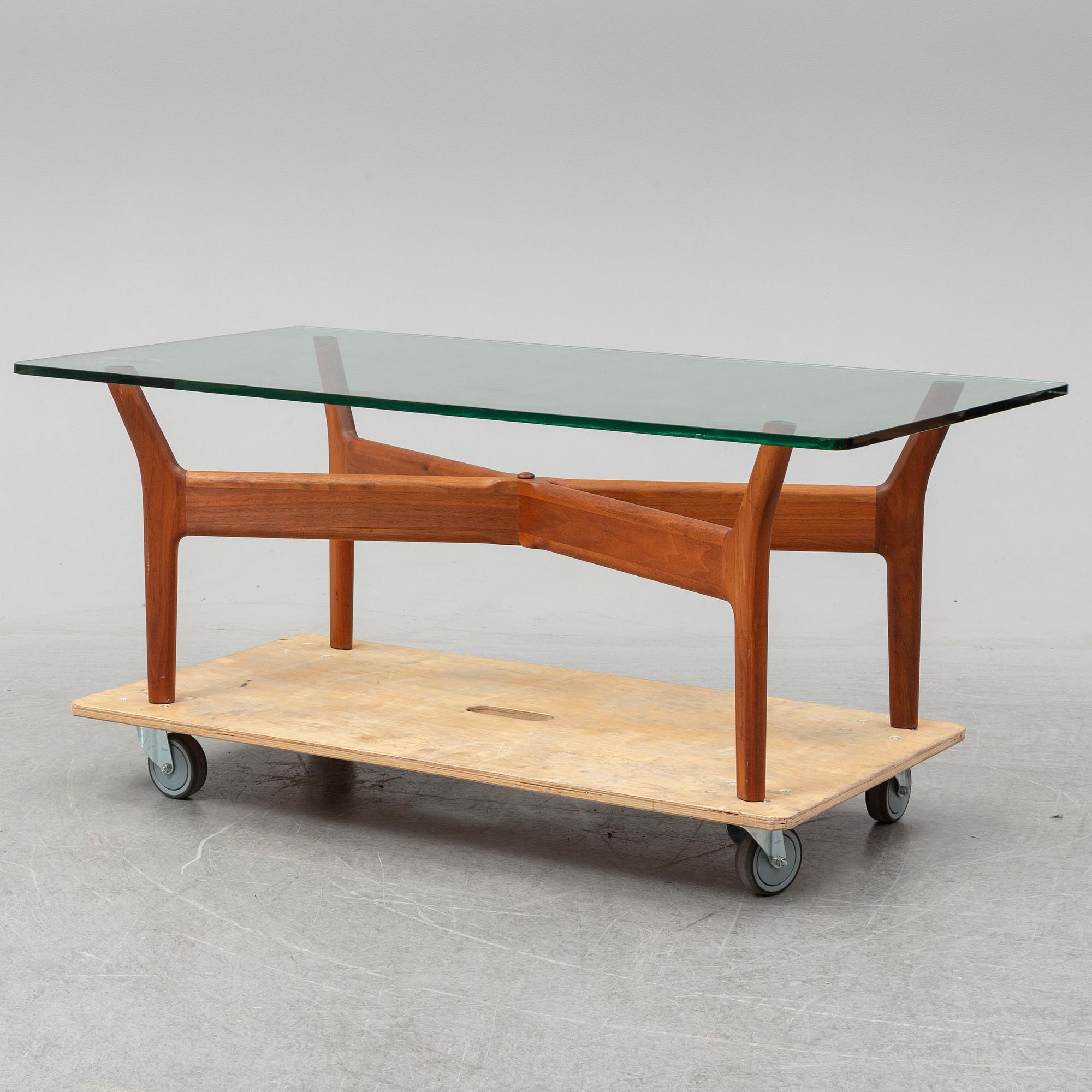 ALF SVENSSON, A teak and glass coffee table, mid 20th Century.