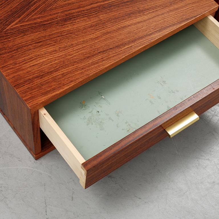 A pair of rosewood veneered coffee tables, 1960's/70's.