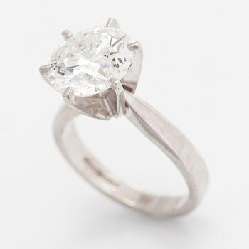 A platinum ring, with a brilliant-cut diamond approximately 3.10 ct. Domino Jewellery, Birmingham, England.