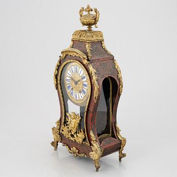 A Louis-XV style mantle clock, France, 19th century.