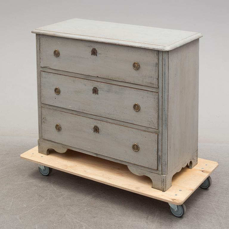 A mid 19th century painted chest of drawers.