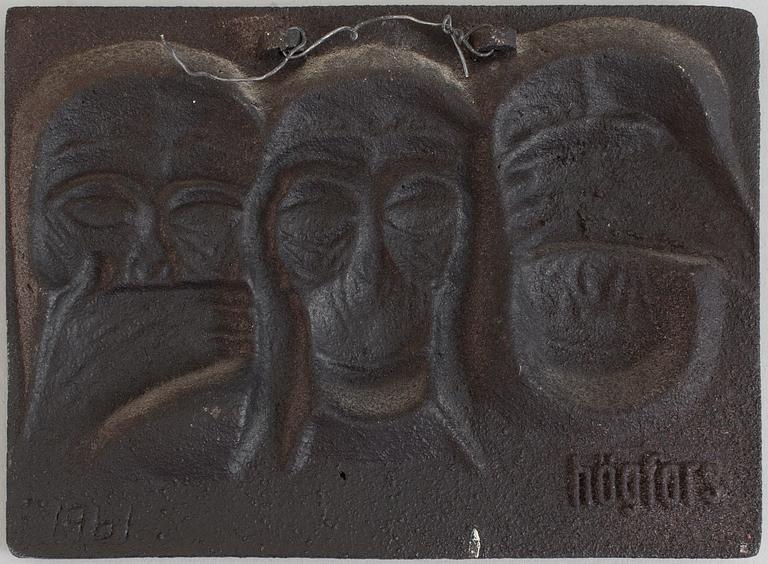 MICHAEL SCHILKIN, a cast iron plaque "See no evil, hear no evil, say no evil", signed and dated Högfors 1961.