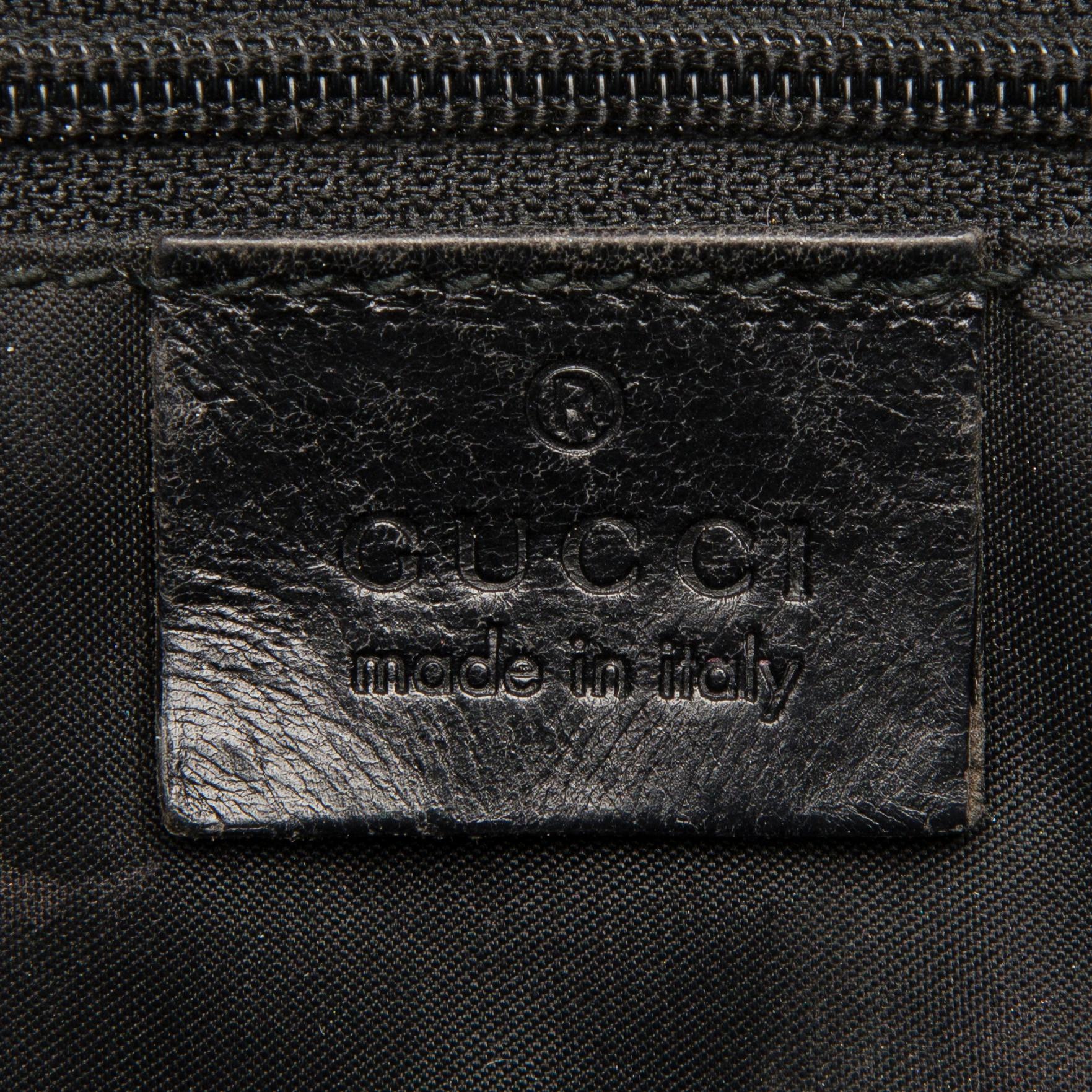 A Black Leather Jackie Bag.