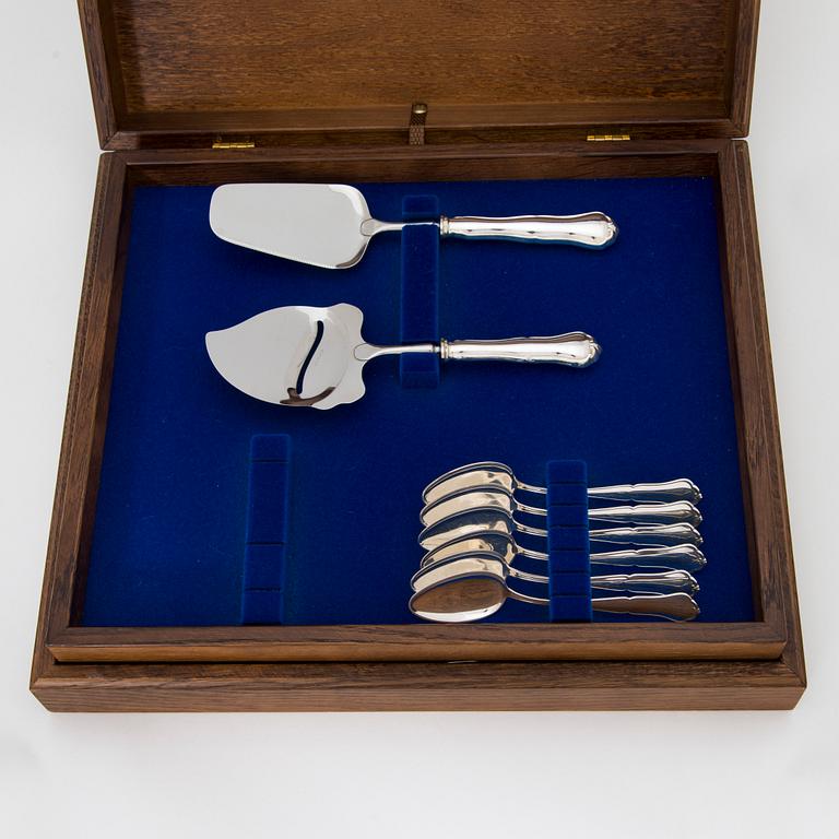A 50-piece set of 'Chippendale' silver cutlery, Auran Kultaseppä, Turku 1989. In two original wooden boxes.