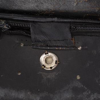 An easy chair and ottoman by Charles & Ray Eames, Herman Miller, USA, produced with licence by Hille, London.