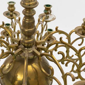 A baroque-style brass eighteen-branch chandelier, late 19th century.