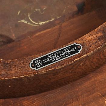 David Blomberg, attributed to, an Art Nouveau oak and copper table, Nordiska Kompaniet, Sweden early 1900's.