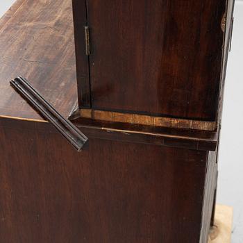 A 19th Century matced mahogany veneered cabinet.