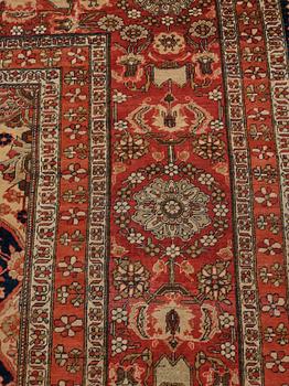 A CARPET, an antique/semi-antique Kashan so called Motachem, ca 333,5-354 x 218-243 cm.