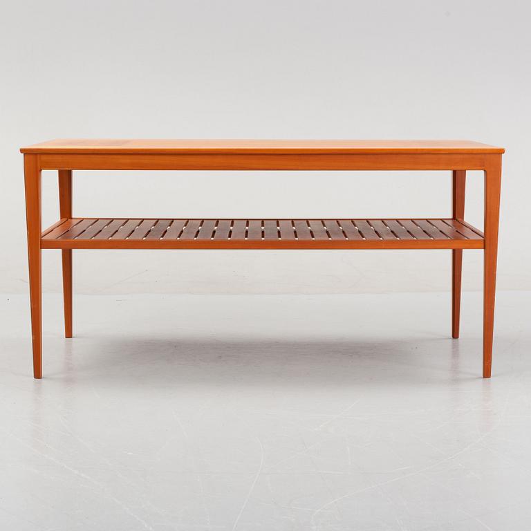 A 'Wetter' walnut coffee table by Carl Malmsten.