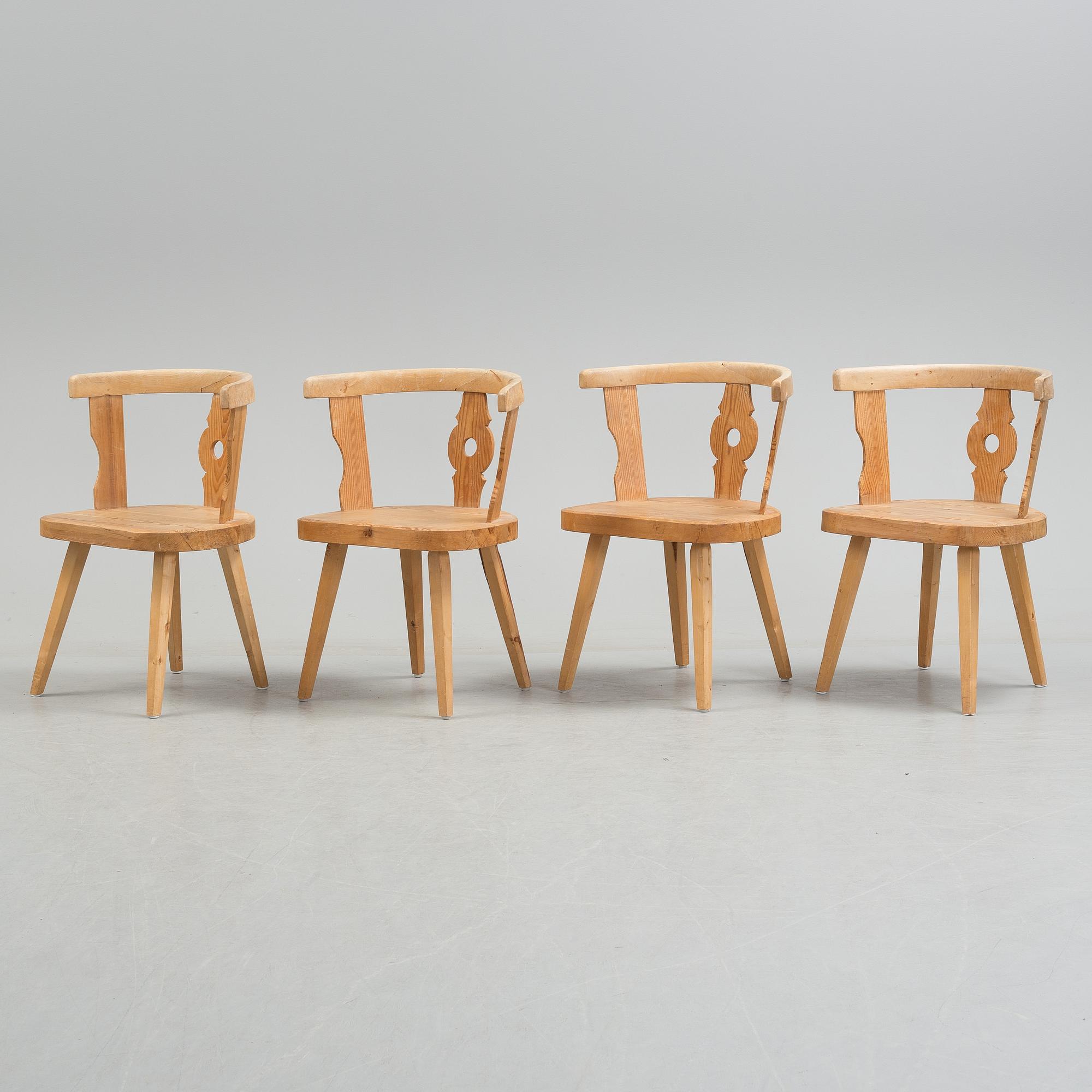 FOUR EARLY 20th CENTURY ARMCHAIRS.