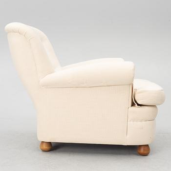 Josef Frank, a model 366 armchair, Firma Svenskt Tenn.