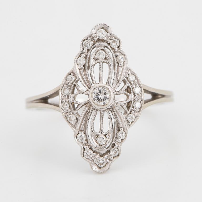 White gold and brilliant-cut diamond ring.