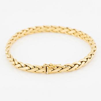 Collier/armband med en rund briljantslipad diamant ca 0.35 ct.