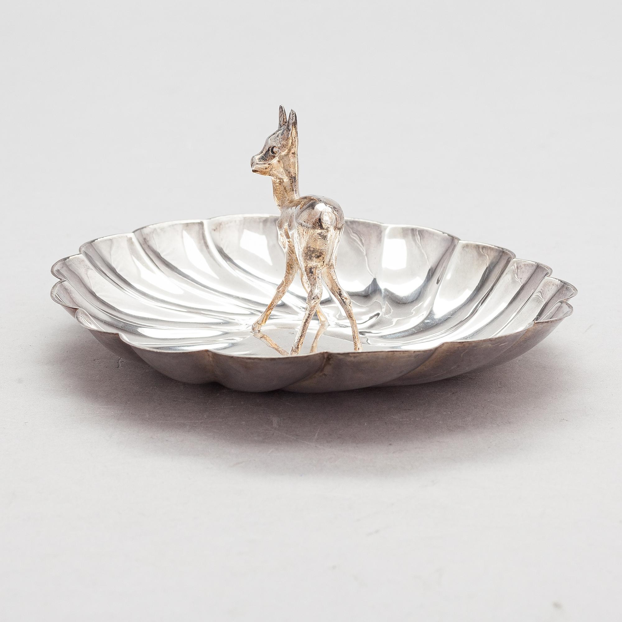 A scalloped silver dish, Pasgorcy, Madrid, Spain, after 1934.