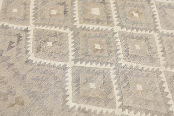 A Kelim carpet, c. 222 x 163 cm.