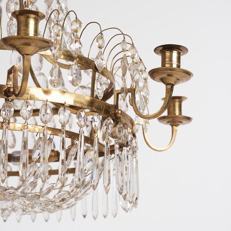 A late Gustavian nine-light gilt brass and cut glass chandelier, Stockholm, late 18th century.