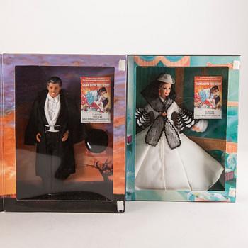 A set of four 1990s Barbie and Ken dolls Mattel.