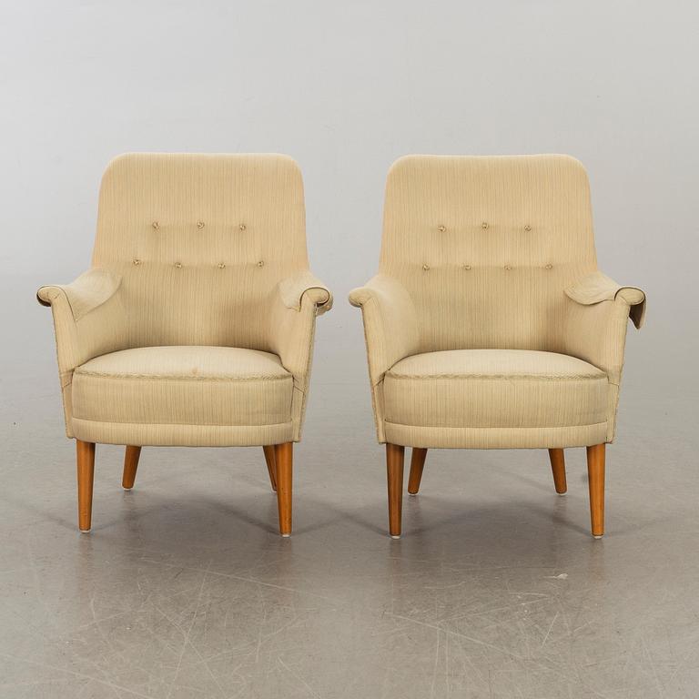 CARL MALMSTEN, a pair of easy chairs.