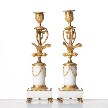 A pair of Louis XVI late 18th century candlesticks.