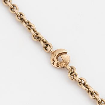 A necklace by Ole Lynggaard, the clasp decorated with a diamond.