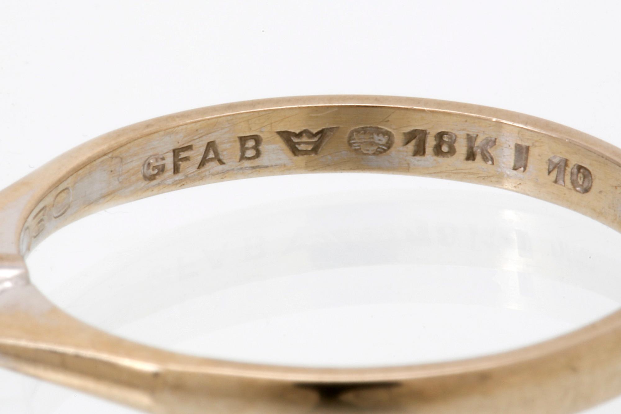 Diamondring 18K whitegold 1 brilliant-cut diamond 0,30 ct inscribed W/TCR VVS, valuation letter Gemmologica AB Stockholm.