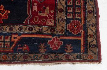 An Oriental rug, c. 282 x 154 cm.