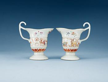 1523. A pair of famille rose ewers, Qing dynasty, Qianlong (1736-95).