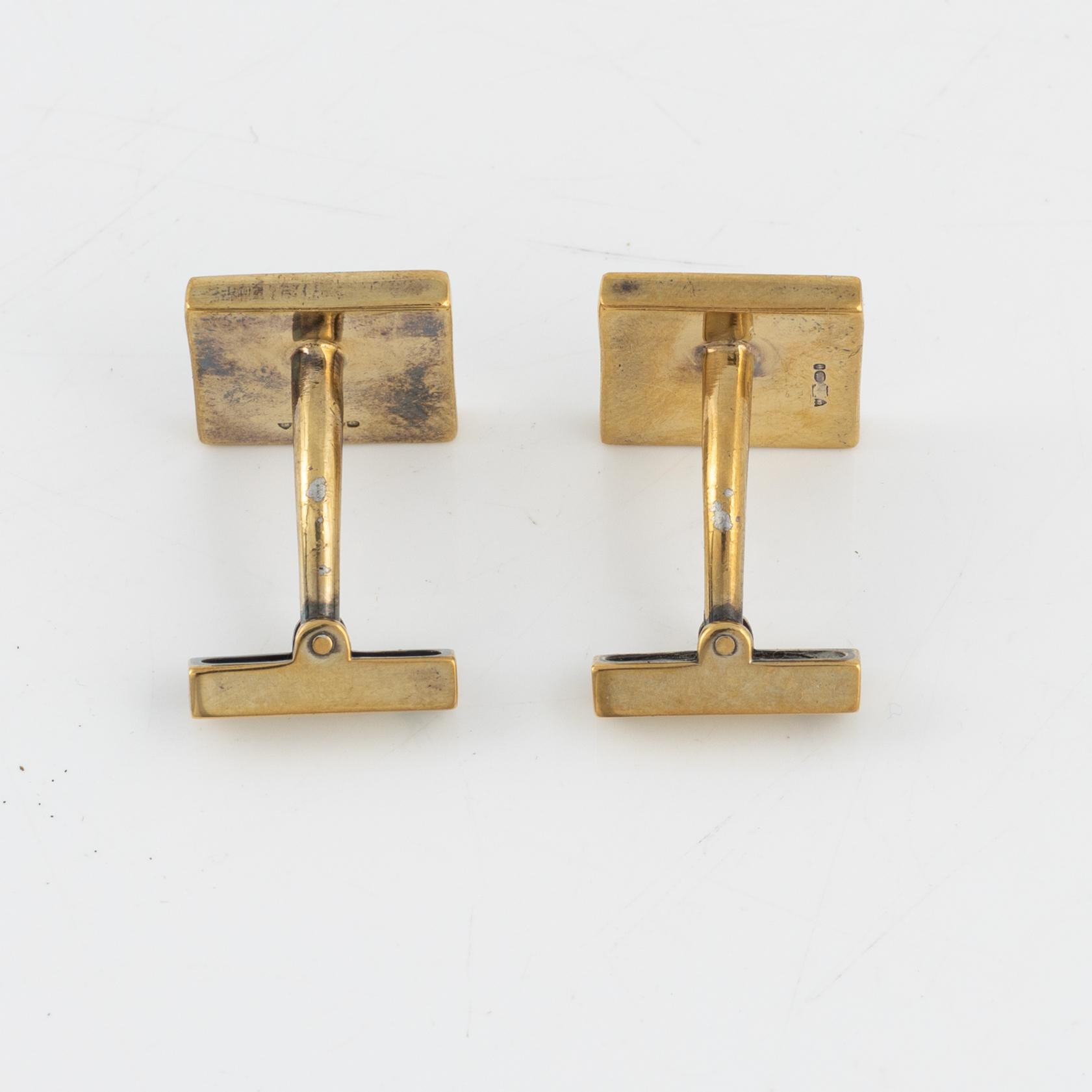 Louis Vuitton, a pair of gold plated silver cufflinks.
