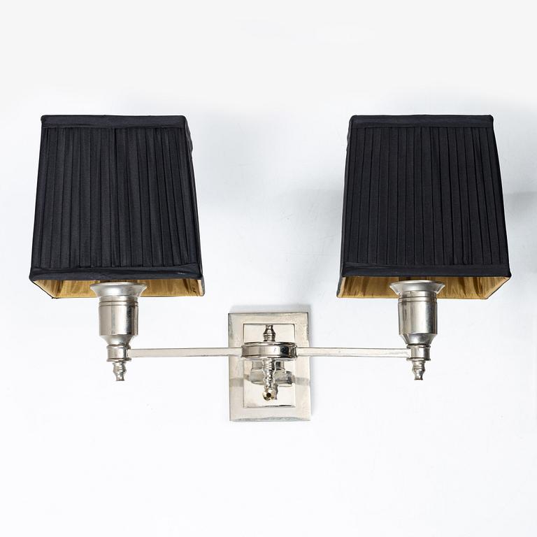 Two wall lamps from Eichholtz.