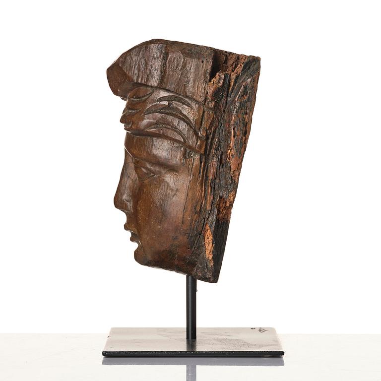 A wooden sculpture presumably Baroque around year 1700.