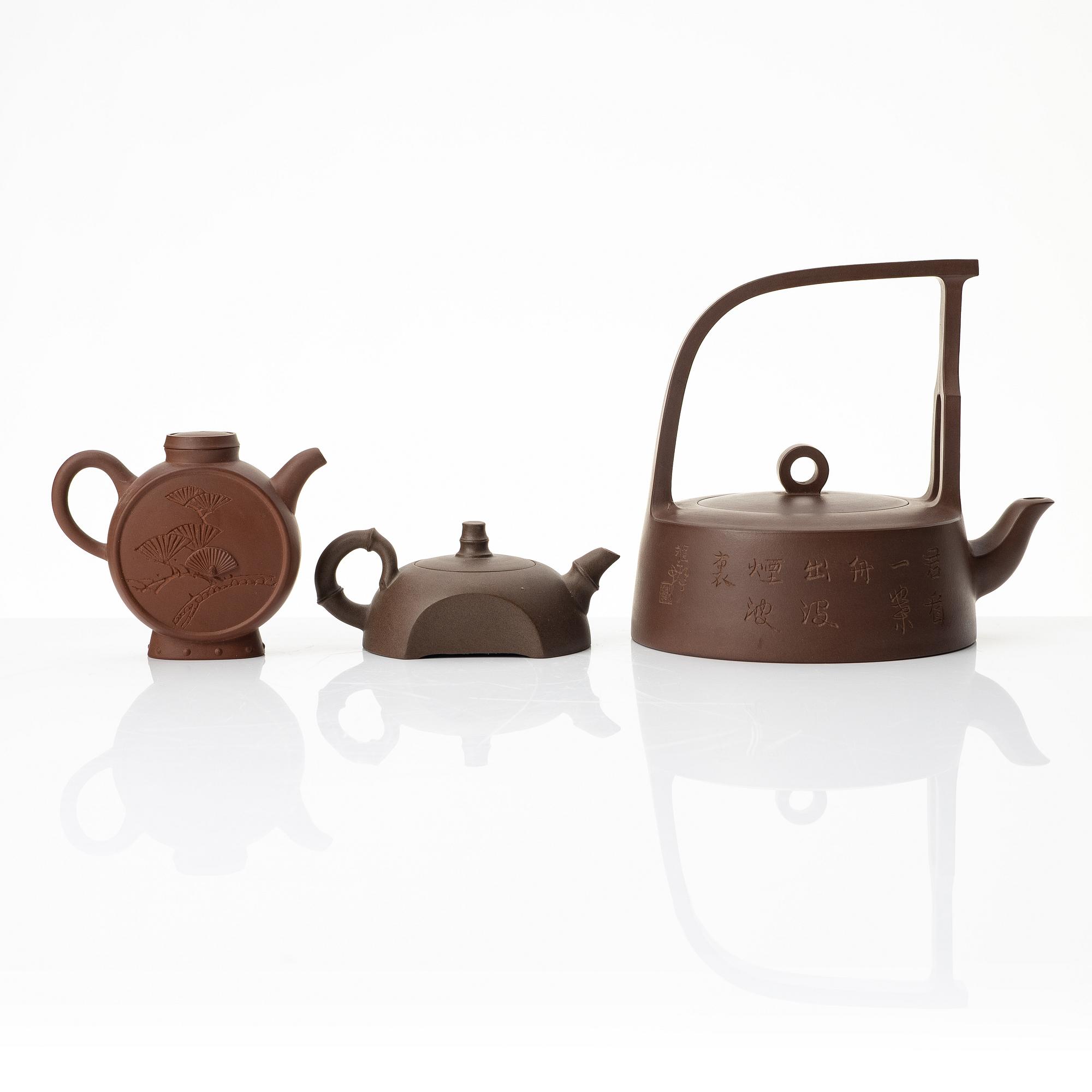 A group of three Chinese yixing teapots, 1980s.