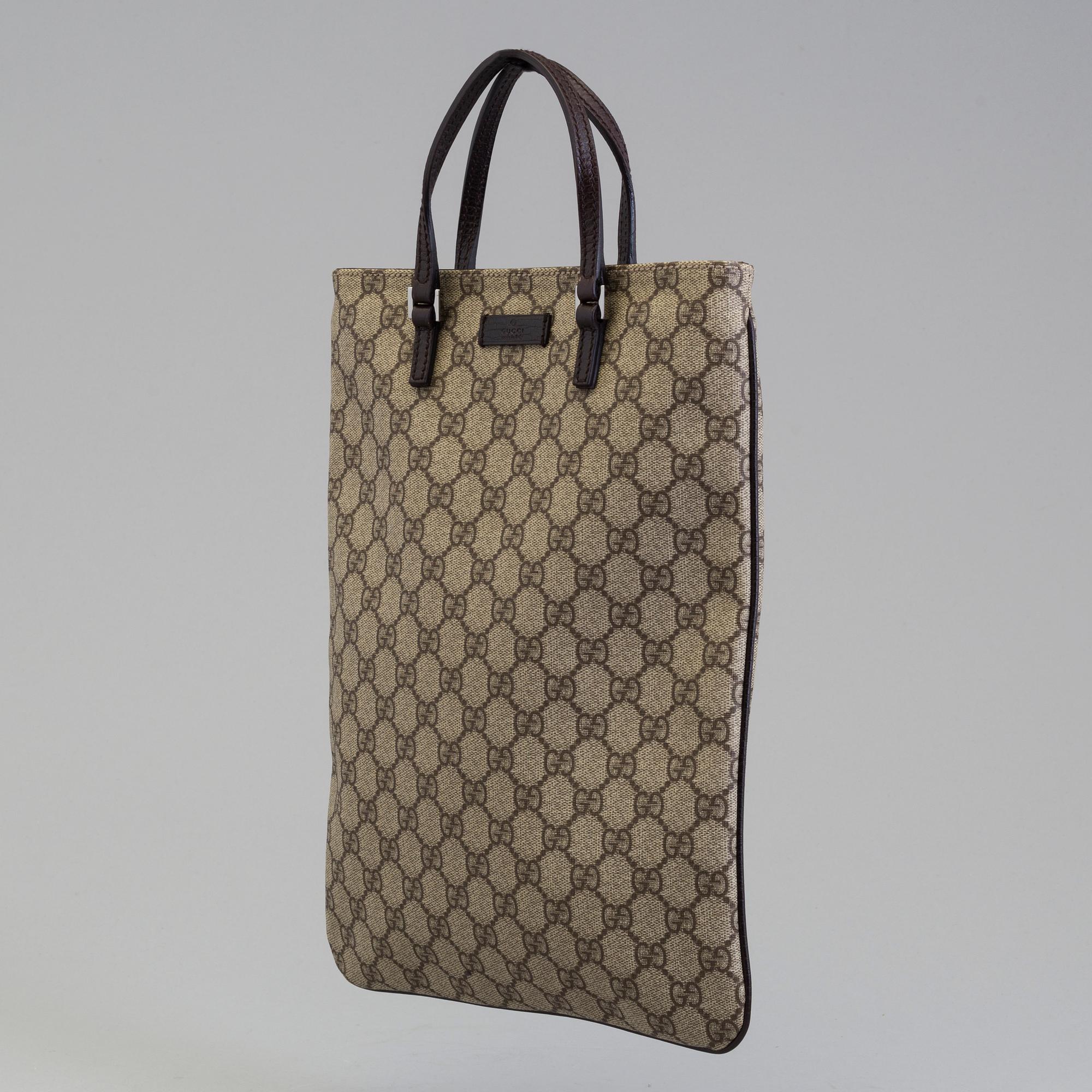 GUCCISSIMA PVC TOTE BAG BY GUCCI.