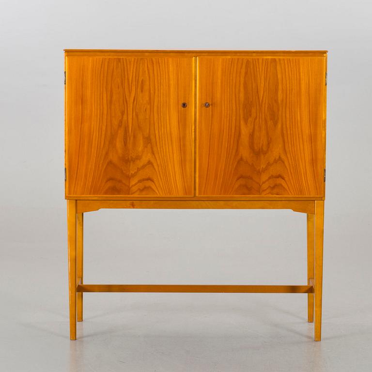 SKÅP, troligen Elias Svedberg, ur Triva-serien, Nordiska Kompaniet.